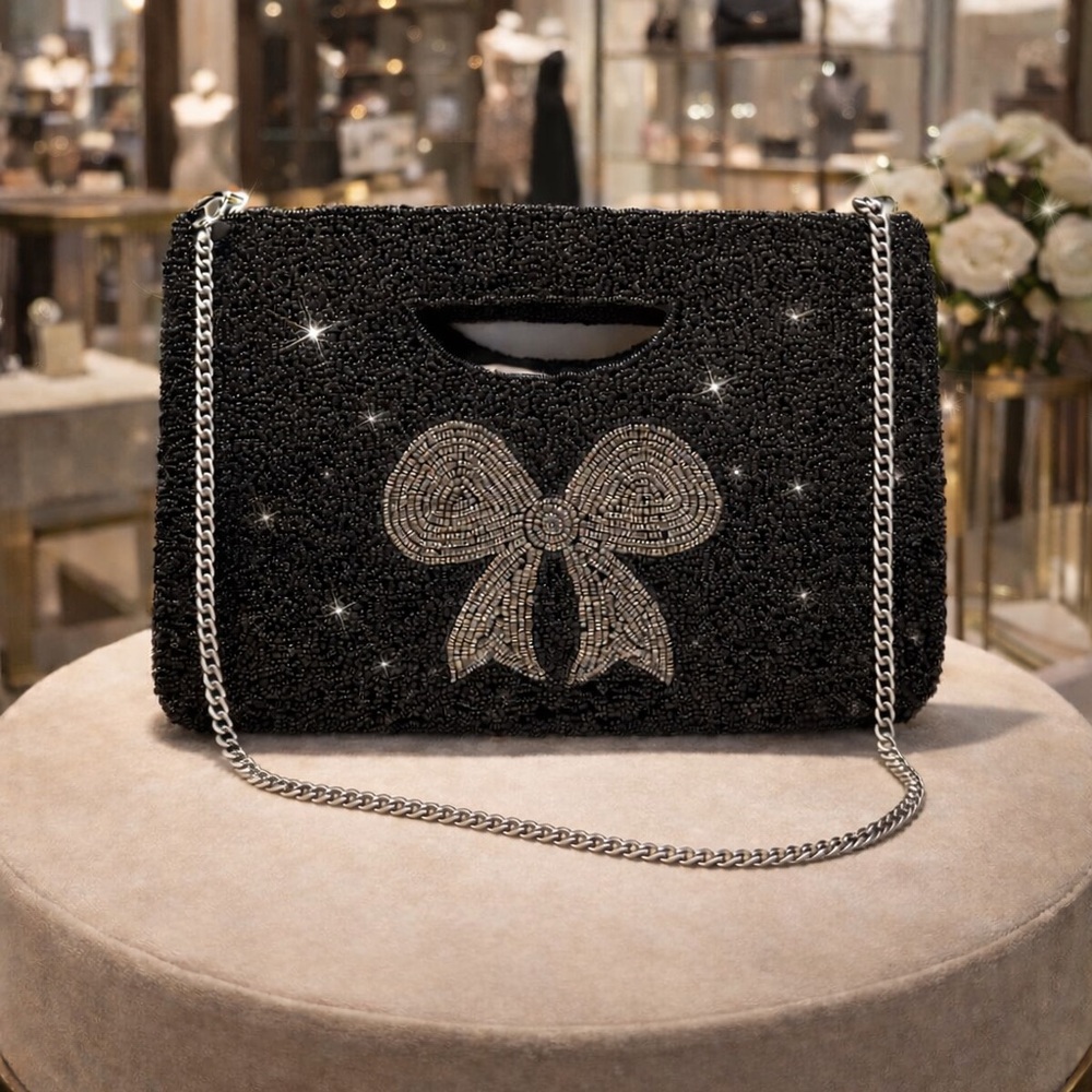 Elegant Black Beaded Clutch with Silver Bow